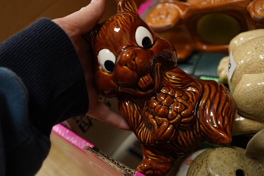 A large quantity (in three boxes) of novelty, advertising and general money boxes mostly from the mid to late 20th century, tallest a clown Ellgreave money box 27cm high. Condition - varied from poor to good